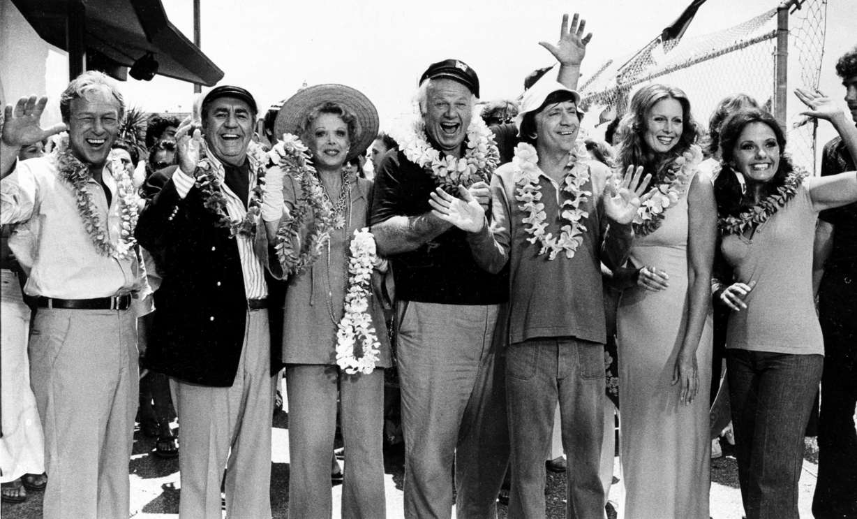 FILE - This Oct. 2, 1978 file photo shows the cast of "Gilligan's Island," from left, Russell Johnson, as the professor; Jim Backus as Thurston Howell III; Natalie Schafer, as Mrs. Howell III; Alan Hale Jr., as the skipper; Bob Denver, as Gilligan; Judith Baldwin replacing original cast member Tina Louise, as Ginger, and Dawn Wells, as Mary Ann. Wells died Wednesday, Dec. 30, 2020, of causes related to COVID-19, her publicist said.