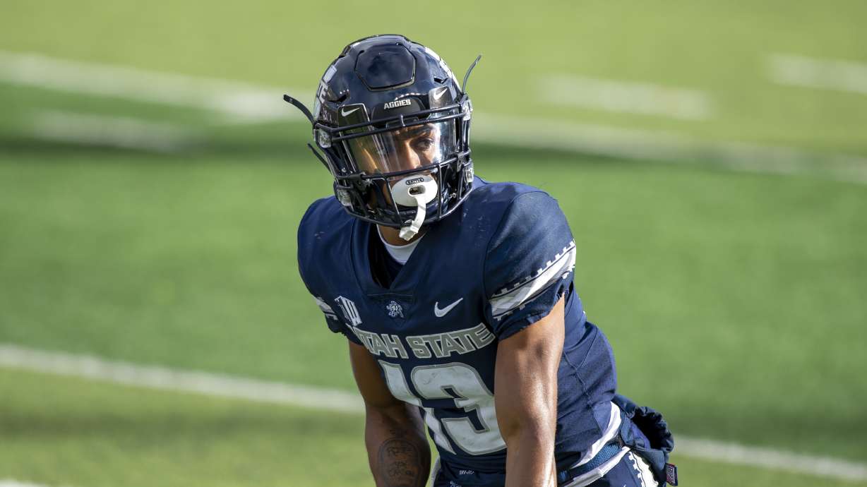 Utah State Aggies wide receiver Deven Thompkins (13) lines up during an NCAA football game on Saturday, Nov. 14, 2020 in Logan, Utah. (AP Photo/Tyler Tate)