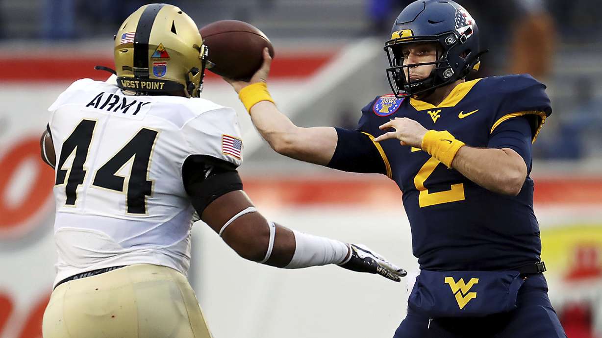 West Virginia rallies to beat Army 24-21 in Liberty Bowl