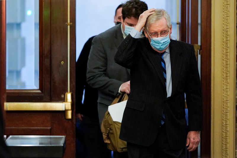U.S. Senate Majority Leader Mitch McConnell (R-KY) arrives before a cloture vote on overriding the veto on the National Defense Authorization Act on Capitol Hill in Washington, U.S., January 1, 2021.  REUTERS/Joshua Roberts