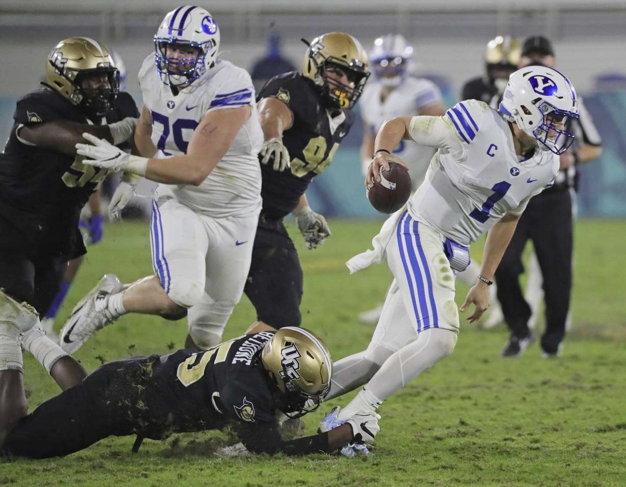 UCF linebacker Tatum Bethune (15) sacks BYU quarterback Zach Wilson (1) in the fourth quarter in the Boca Raton Bowl NCAA college football game at FAU Stadium in Boca Raton, Fla. Tuesday, Dec. 22, 2020.