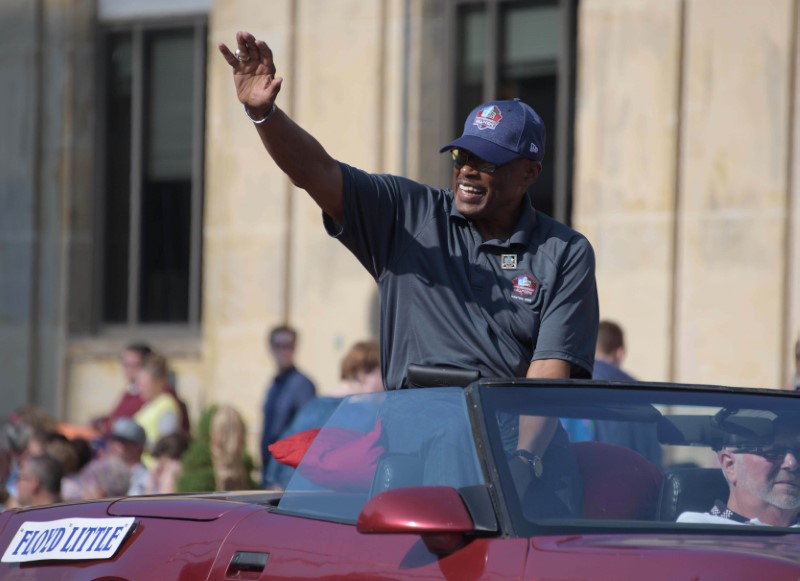 FILE PHOTO: Aug 4, 2018; Canton, OH, USA; Denver Broncos former halfback Floyd Little acknowledges the crowd during the Pro Football Hall of Fame Grand Parade on Cleveland Avenue. Mandatory Credit: Kirby Lee-USA TODAY Sports