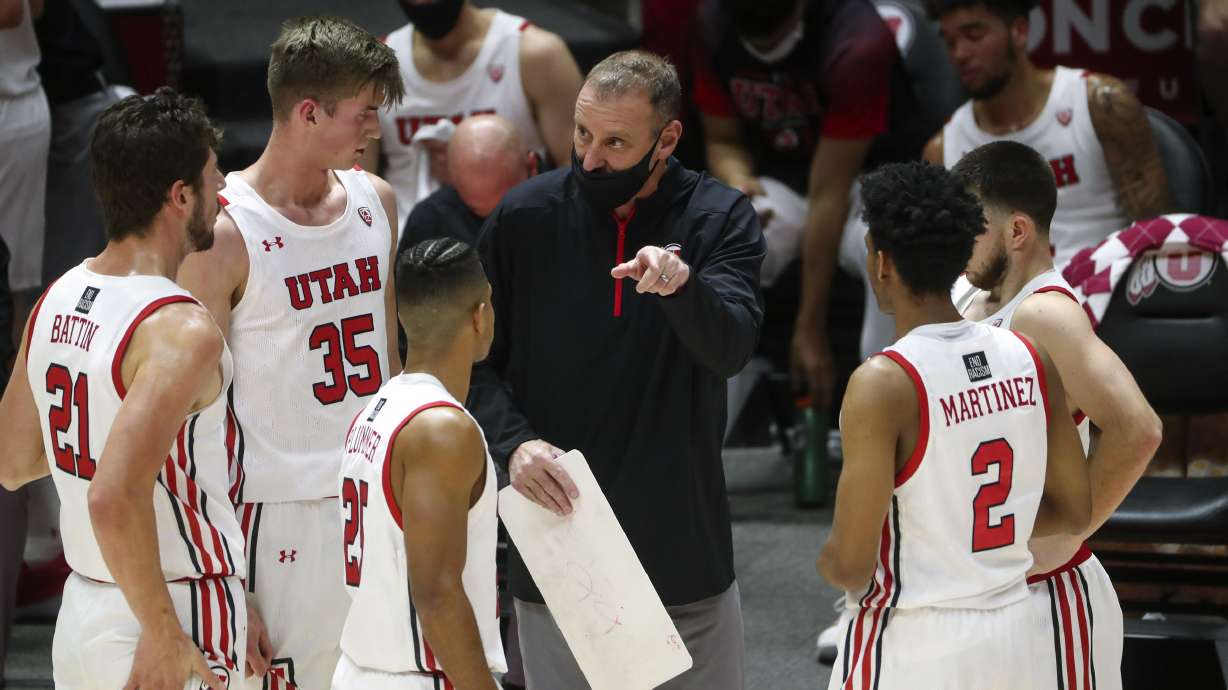 Utah Utes head coach Larry Krystkowiak talks with his team during a game against UVU at the Huntsman Center in Salt Lake City on Tuesday, Dec. 15, 2020.