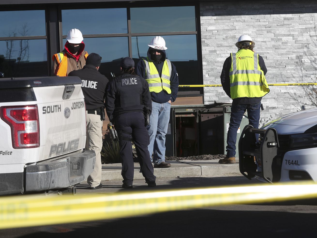 South Jordan police and Rocky Mountain Power officials
investigate an electrocution at a construction site near 11400
South and 3700 West in South Jordan on Monday, Jan. 4, 2021.