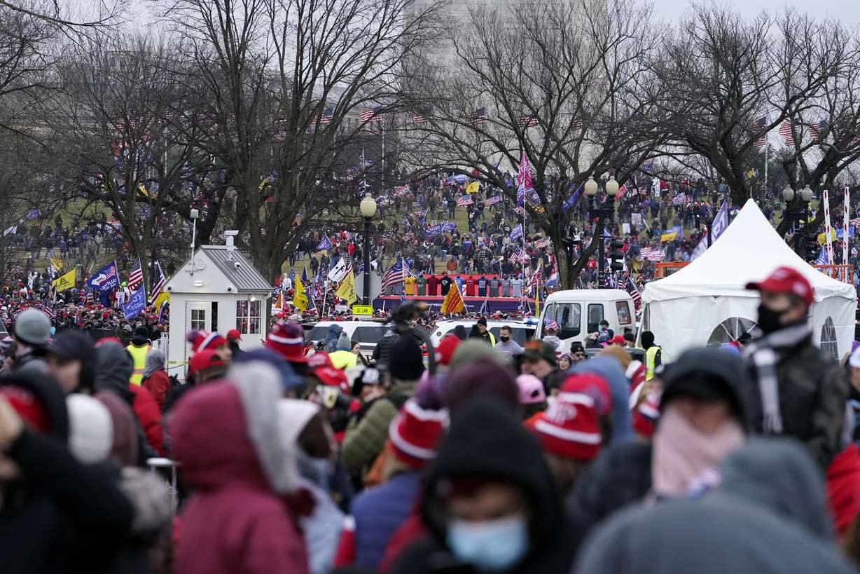 People attend a rally in support of President Donald Trump called the "Save America Rally," Wednesday, Jan. 6, 2021, in Washington.