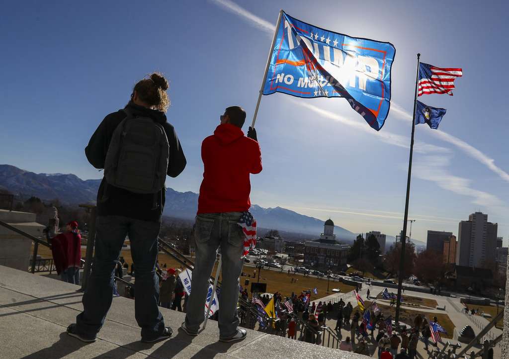 Supporters of President Donald Trump rally on the steps of the Capitol in Salt Lake City on Wednesday, Jan. 6, 2021.