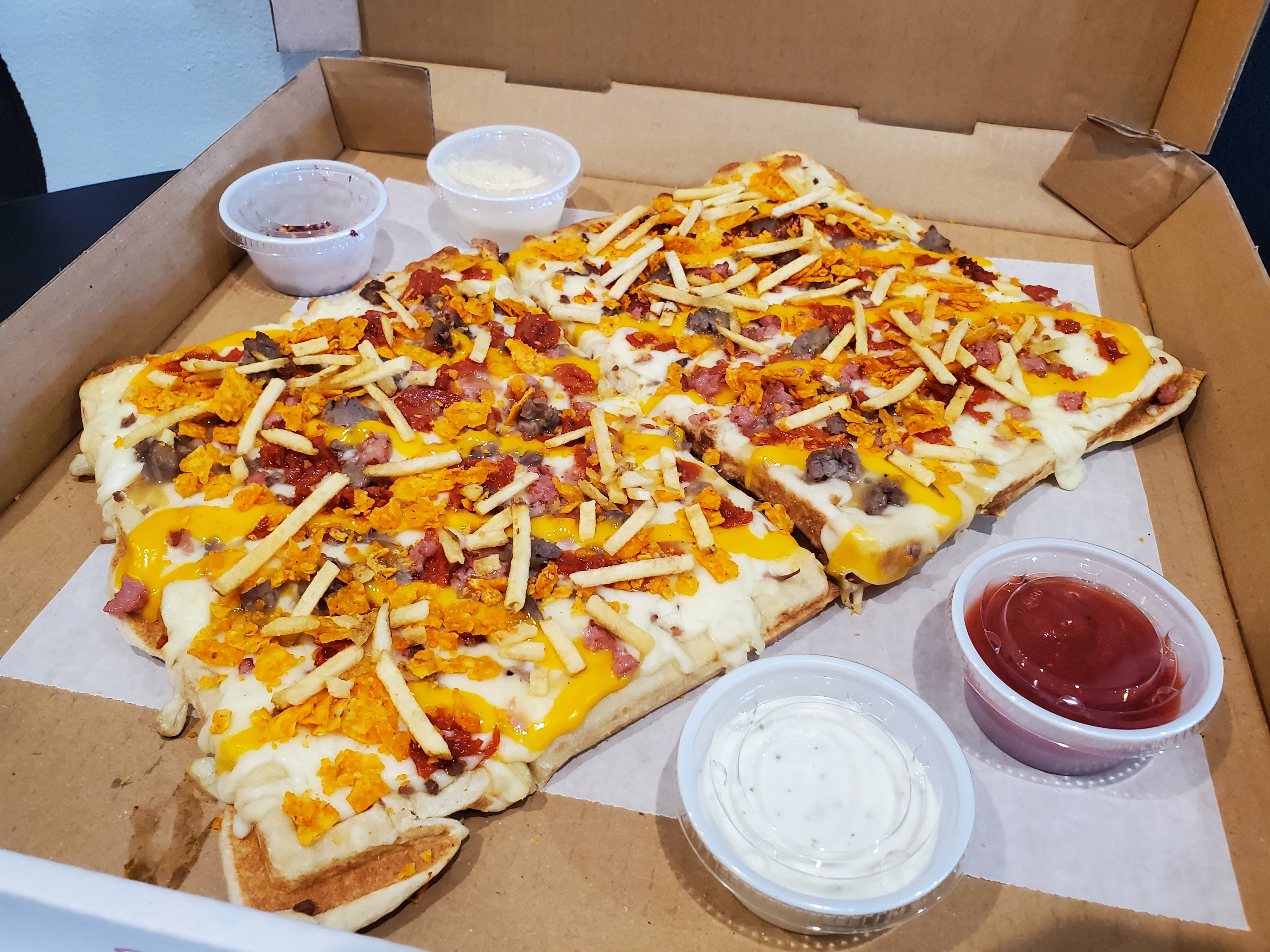 One Dude's Pizza Co. sells deep dish style pizza with a waffle crust and Utah-themed flavors like its "Funeral Potatoes" pizza.