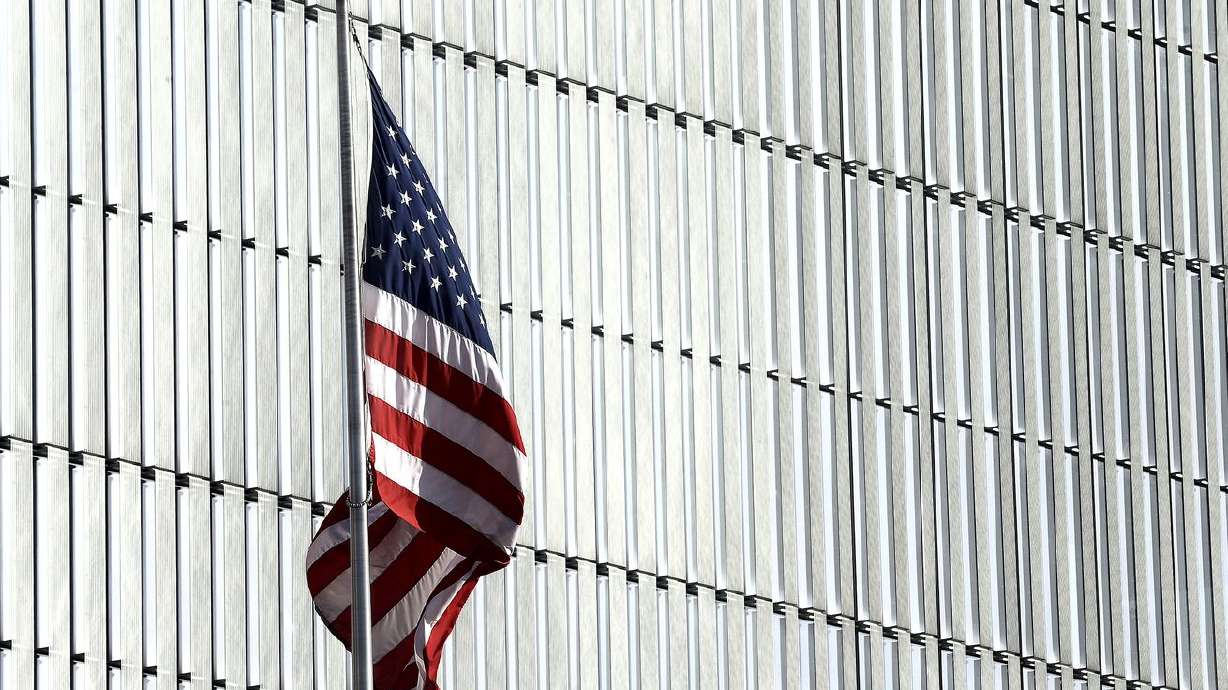 A flag flies in front of the federal courthouse in Salt
Lake City on Tuesday, Feb. 18, 2020.
