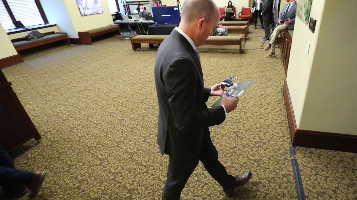 Gov. Spencer Cox leaves the room after speaking at a COVID-19 briefing at the Capitol in Salt Lake City on Friday, Jan. 8, 2021.