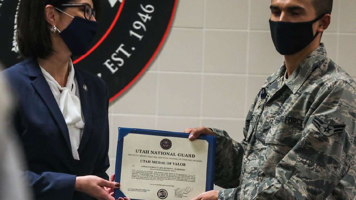 Utah Lt. Gov. Deidre Henderson, left, presents the Utah
Medal of Valor to Airman 1st Class Jensen Martinez at the Roland R.
Wright Air National Guard Base in Salt Lake City on Saturday, Jan.
9, 2020.