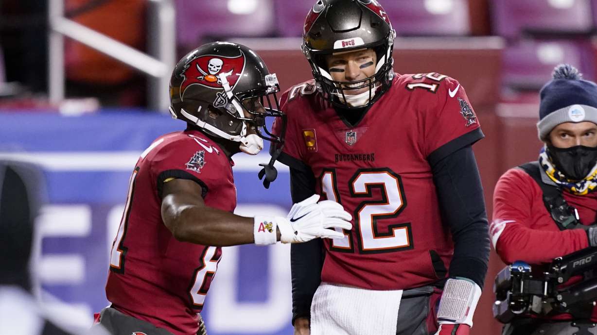 Brady outduels Heinicke, leads Buccaneers past Washington