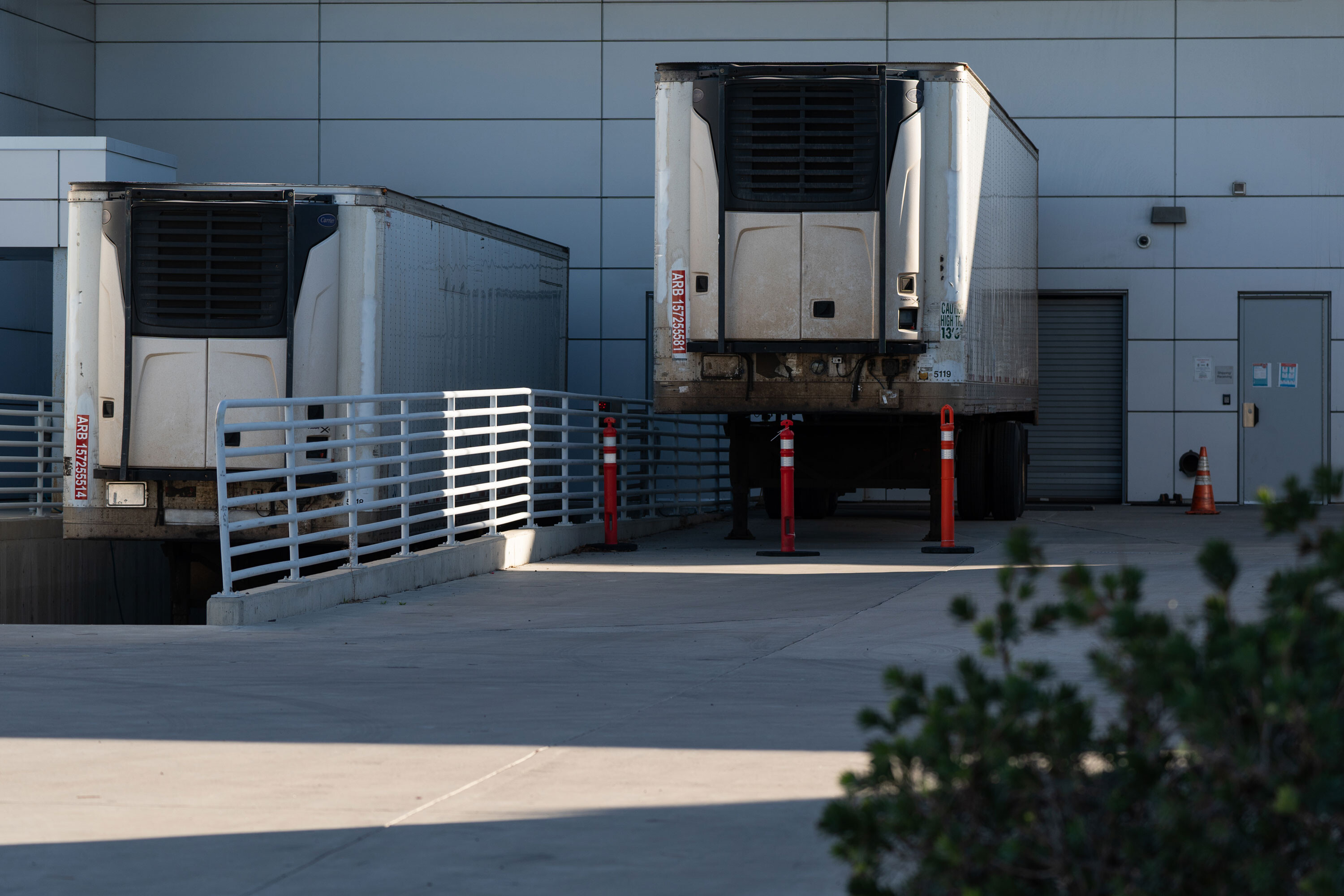 Refrigerated overflow morgue trailers outside the San Diego County Medical Examiner's Office in the Kearny Mesa neighborhood of San Diego on January 11, 2021.