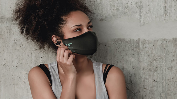 This face mask, showcased at CES 2021, makes it easier to talk on the phone with its built-in (and removable) Bluetooth headphones.