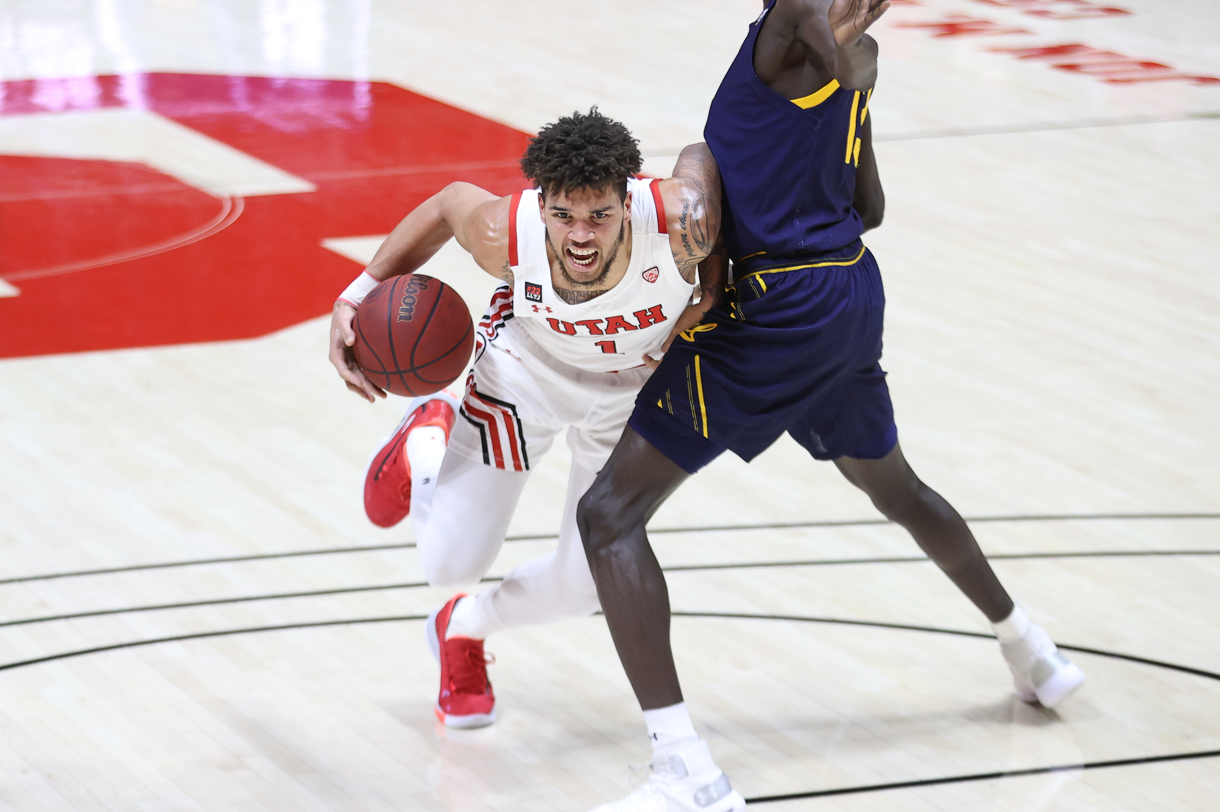 Utah's Timmy Allen tried to drive against California at the Huntsman Center in Salt Lake City on Jan. 16, 2021.