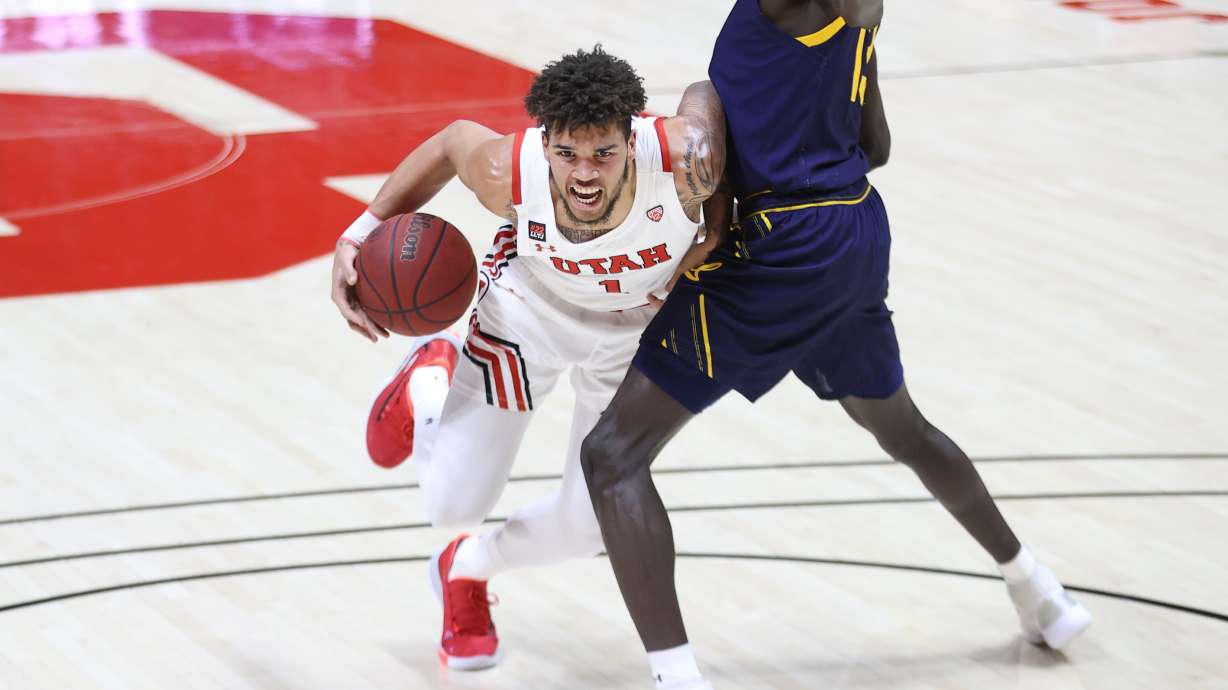 Utah's Timmy Allen tried to drive against California at the Huntsman Center in Salt Lake City on Jan. 16, 2021.