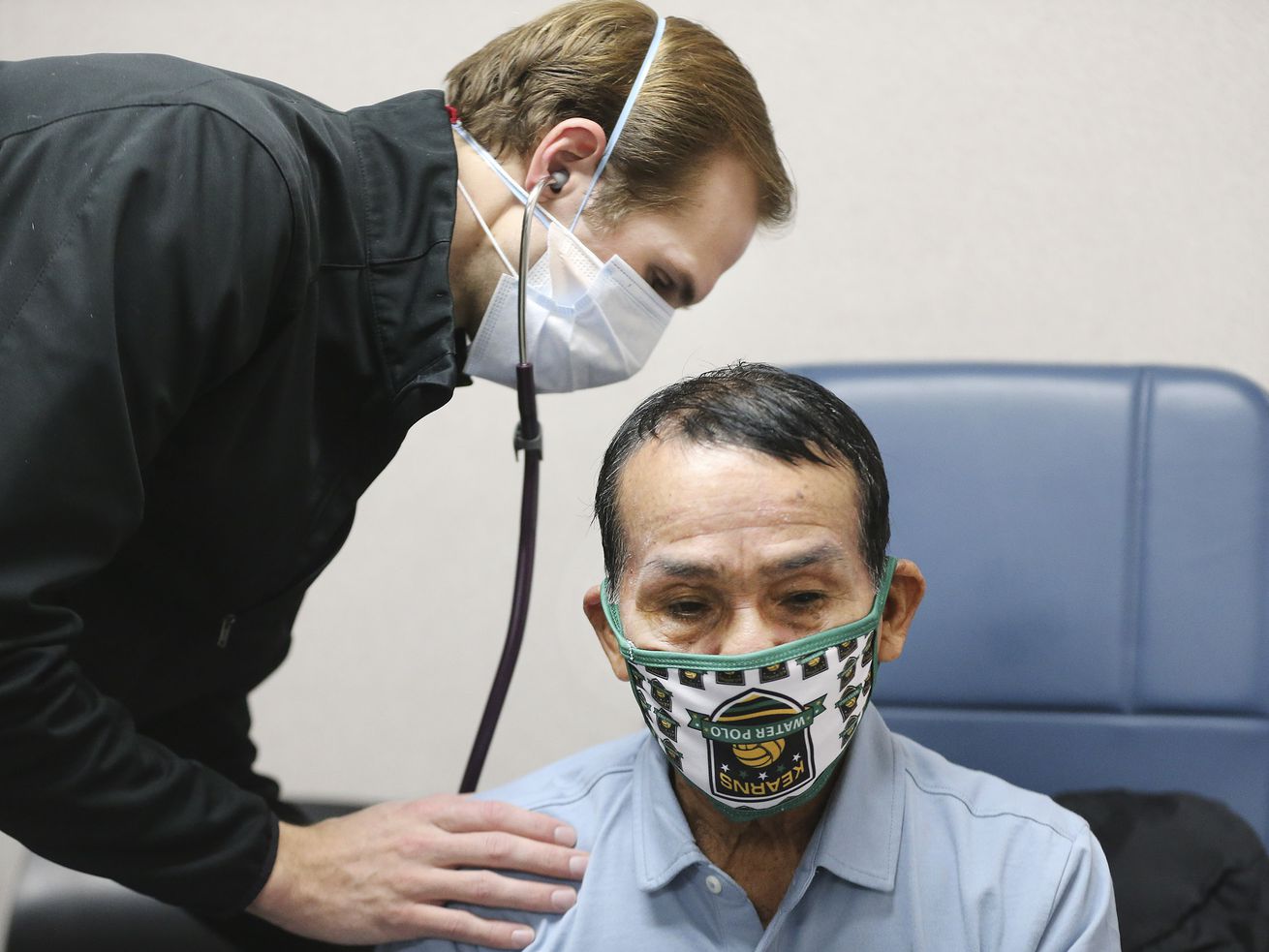 Hope Clinic physician assistant Matt Pierce examines
patient Luis Hualinga at the clinic in Midvale on Wednesday, Jan.
6, 2021. Two bills to be considered by the Utah Legislature would
broaden the role of physician assistants to let them offer mental
health therapy and respond during a health emergency.
