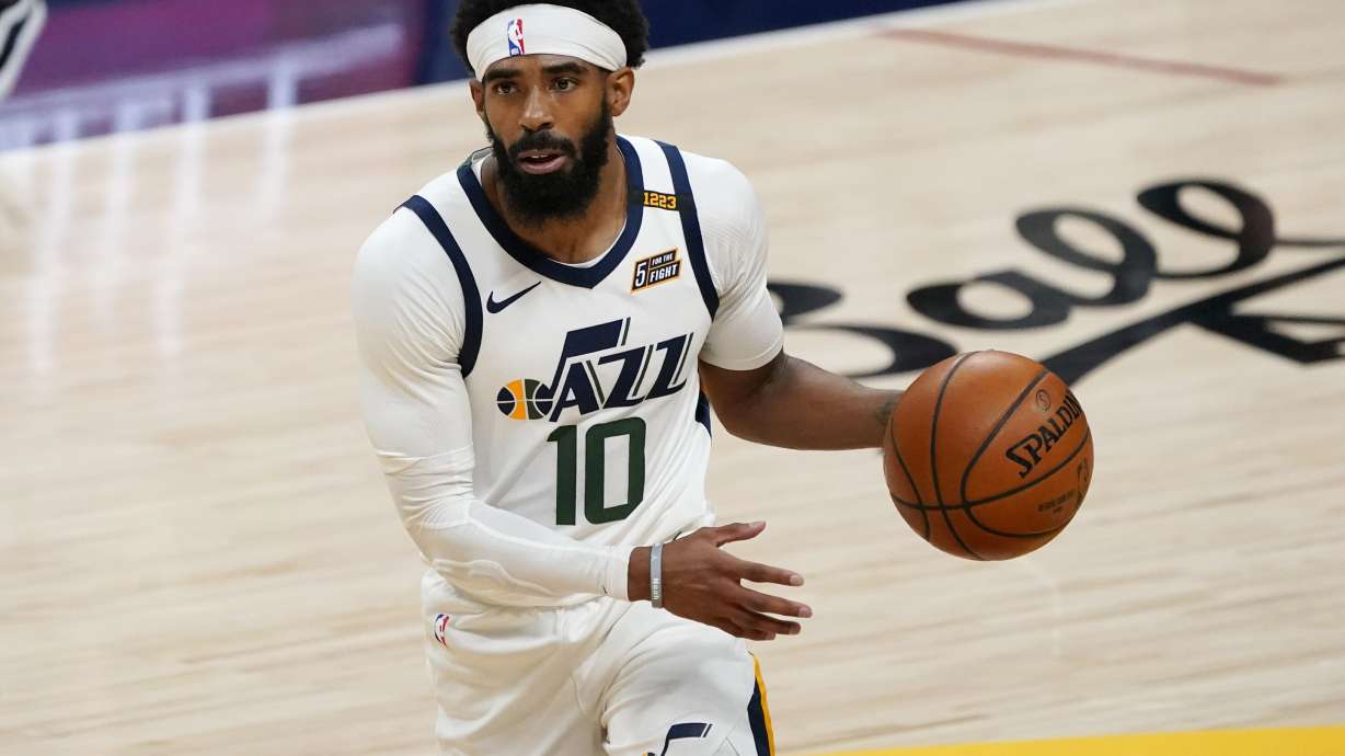 Utah Jazz guard Mike Conley in the first half of an NBA basketball game against the Denver Nuggets Sunday, Jan. 17, 2021, in Denver. (AP Photo/David Zalubowski)