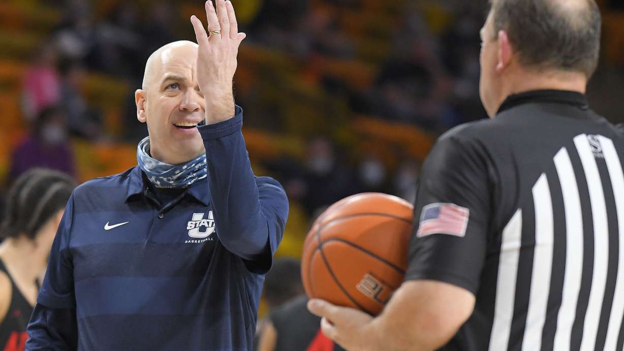 Utah State head coach Craig Smith argues a call during the second half of an NCAA college basketball game Saturday, Jan. 16, 2021, in Logan, Utah. (Eli Lucero/The Herald Journal via AP, Pool)