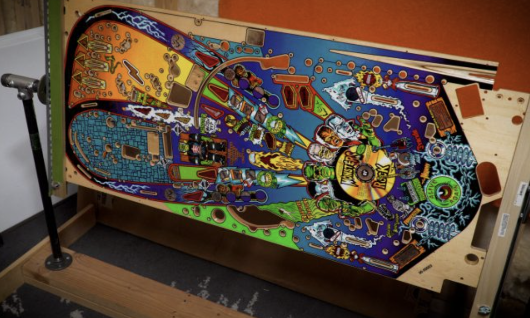 A new play surface awaits installation on a customer's machine.