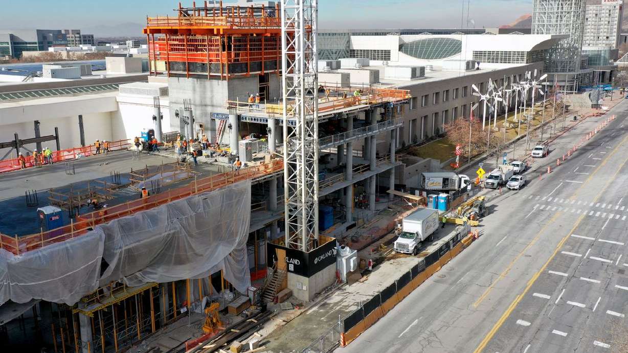 Construction crews work on the 25-floor, 700-room Hyatt
Regency Salt Lake City adjoining the Salt Palace Convention
Center in Salt Lake City on Wednesday, Jan. 13, 2021.