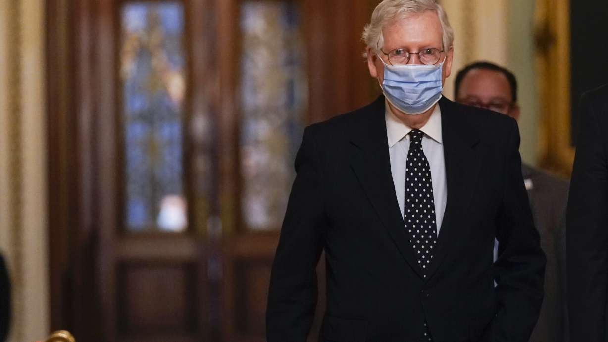 In this Jan. 6, 2021, photo, Senate Majority Leader Mitch McConnell of Ky., walks from the Senate floor to his office on Capitol Hill in Washington. Now that the House has impeached President Donald Trump for the second time, House Speaker Nancy Pelosi must figure out the best strategy for arguing the case before the Senate. Senate rules say the trial must start soon after the chamber receives the article of impeachment, which cites “incitement of insurrection” after an angry mob of Trump’s supporters invaded the Capitol last week.