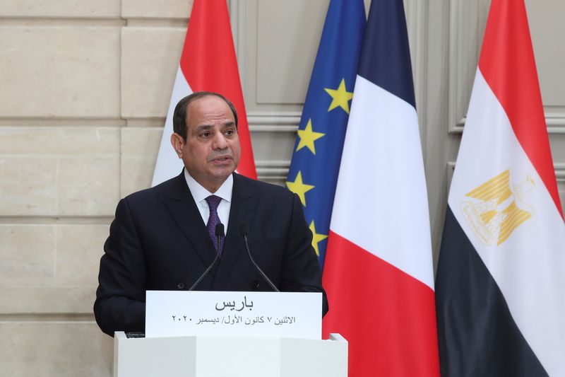 FILE PHOTO: Egyptian President Abdel Fattah al-Sisi speaks during a joint news conference with French President Emmanuel Macron at the Elysee palace, France December 7, 2020. Egyptian President Abdel Fattah al-Sisi is paying a state visit to France for talks on fighting terrorism, the conflict in Libya and other regional issues. Michel Euler/Pool via REUTERS