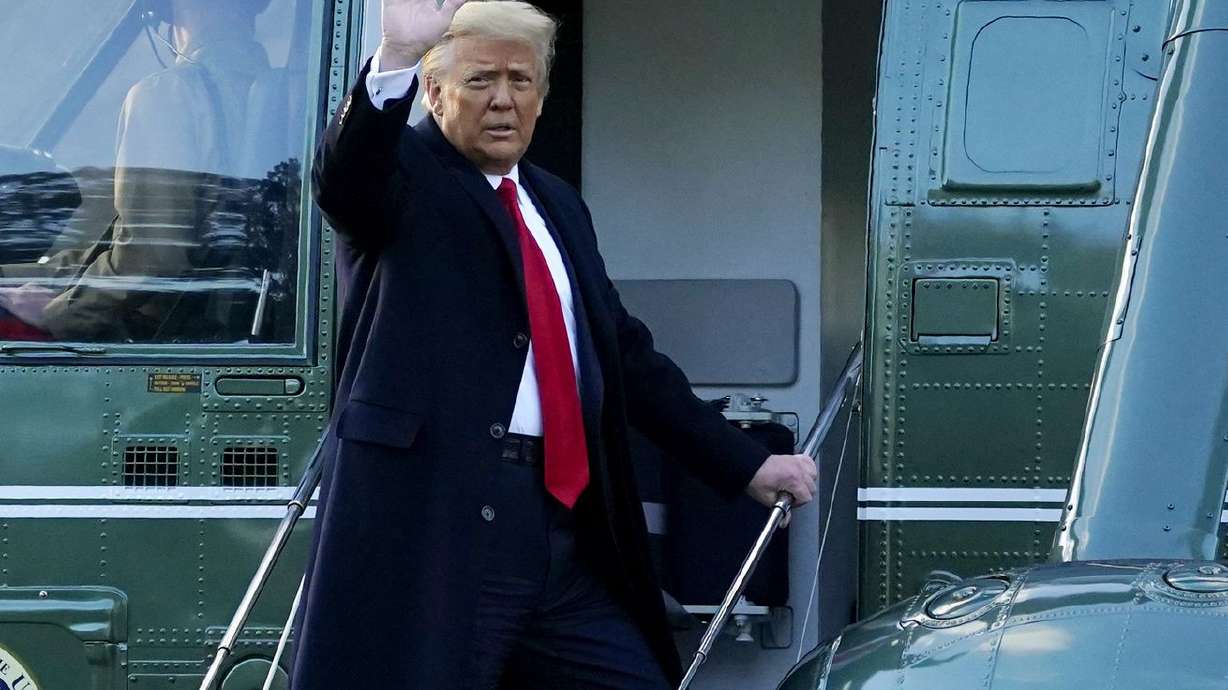 President Donald Trump waves as he boards Marine One on
the South Lawn of the White House, Wednesday, Jan. 20, 2021, in
Washington. Trump is en route to his Mar-a-Lago Florida Resort.