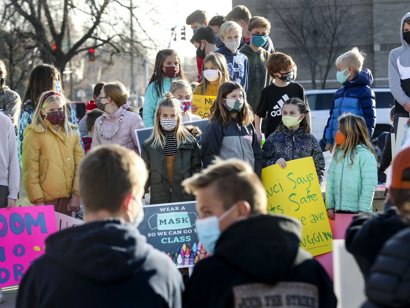 Salt Lake City School District students of all ages
rally in favor of attending school in person outside of East High
School in Salt Lake City on Monday, Dec. 7, 2020.