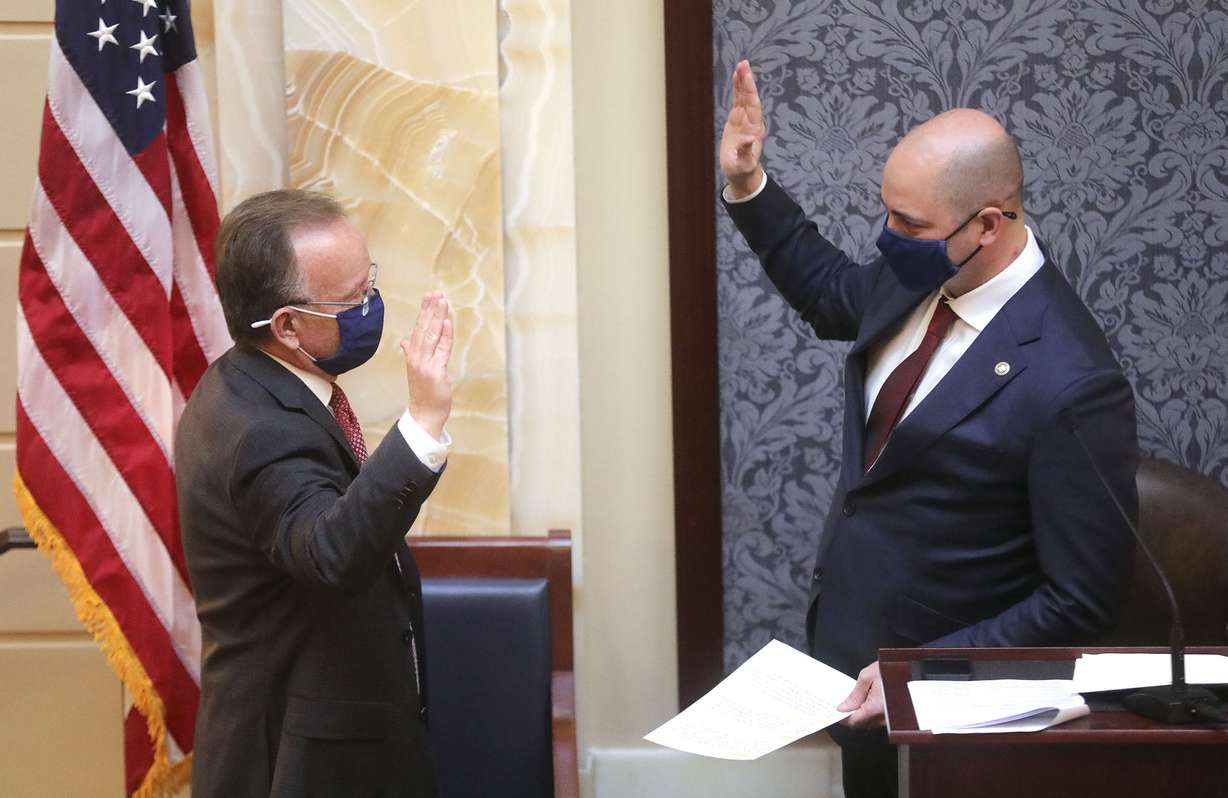 Senate President Stuart Adams, R-Layton, is sworn by Dan Hemmert, director of the Governor’s Office of Economic Development, during the first day of the 2021 general legislative session in the Senate chamber at the Capitol in Salt Lake City on Tuesday, Jan. 19, 2021.