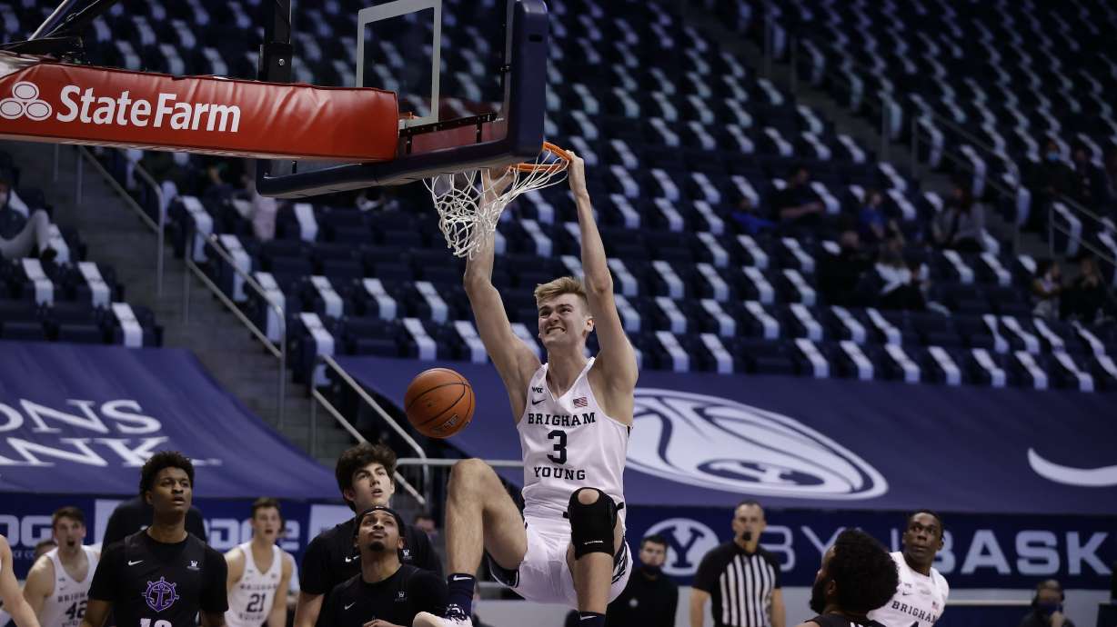 Matt Haarms dunks against Portland in BYU's win over the Pilots, Thursday, Jan. 21, 2021 in the Marriott Center in Provo.