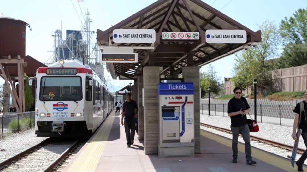 Travelers get off a TRAX train at the Draper Town Center stop in Draper on Wednesday, May 10, 2017. The stop is the terminus of the Blue Line.