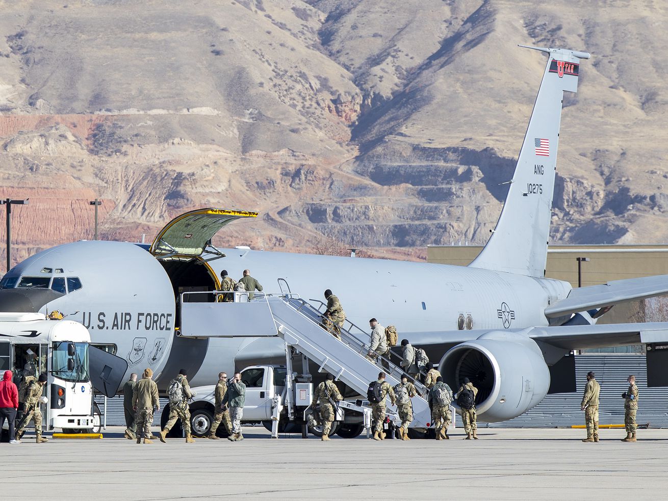 Members of the Utah National Guard board a KC-135 jet
at Roland R. Wright Air National Guard Base in Salt Lake City on
Friday, Jan. 15, 2021. The Guardsmen are bound for Washington,
D.C., to support civil authorities during the inauguration of
President-elect Joe Biden.