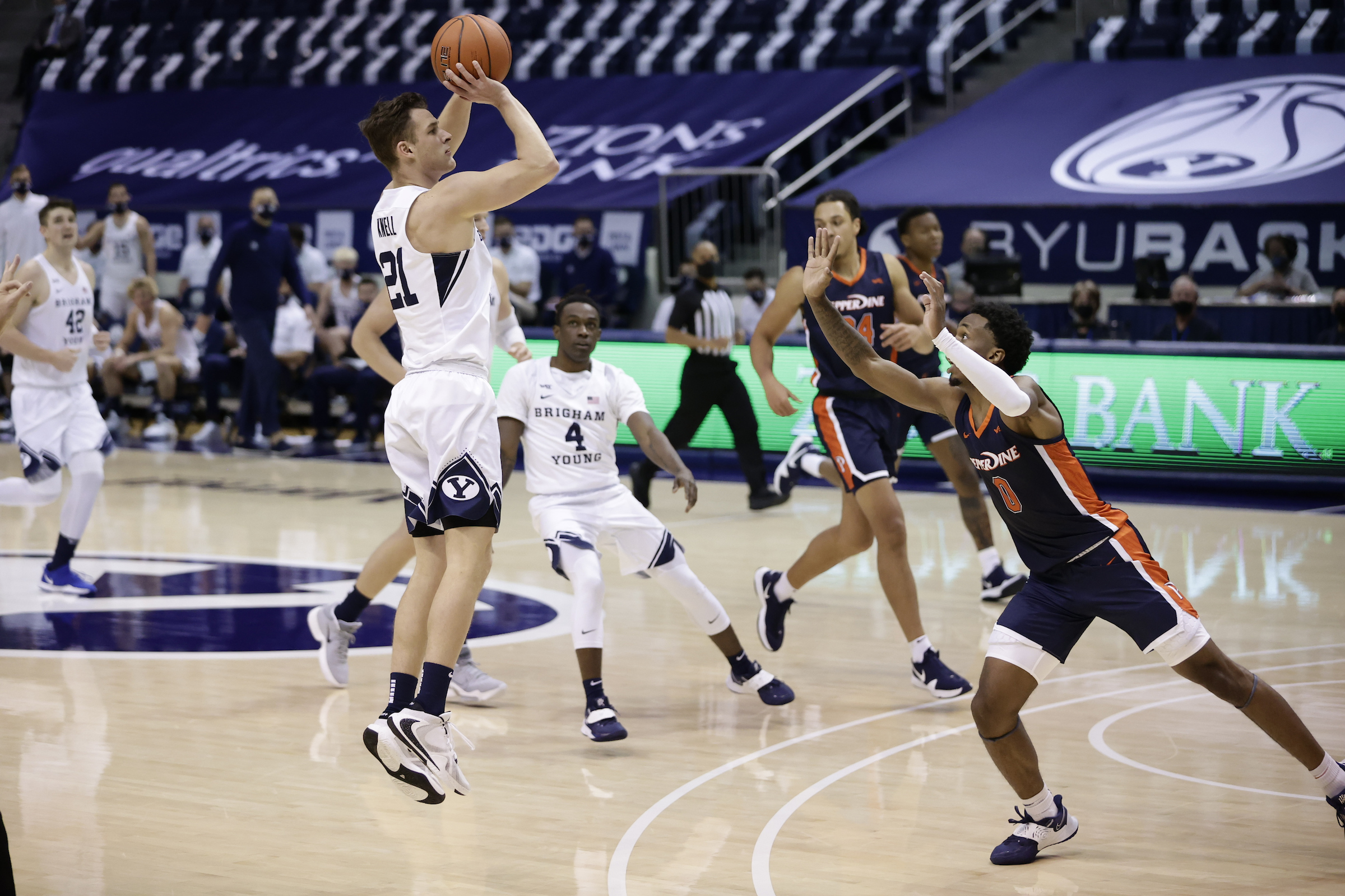 BYU guard Trevin Knell shoots a 3-pointer during a West Coast Conference game against Pepperdine, Saturday, Jan. 23, 2021 in Provo.