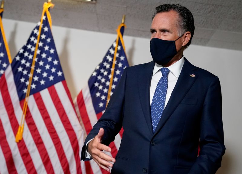 FILE PHOTO: U.S. Senator Mitt Romney (R-UT) arrives at a luncheon on Capitol Hill in Washington, U.S., September 23, 2020. REUTERS/Erin Scott/File Photo