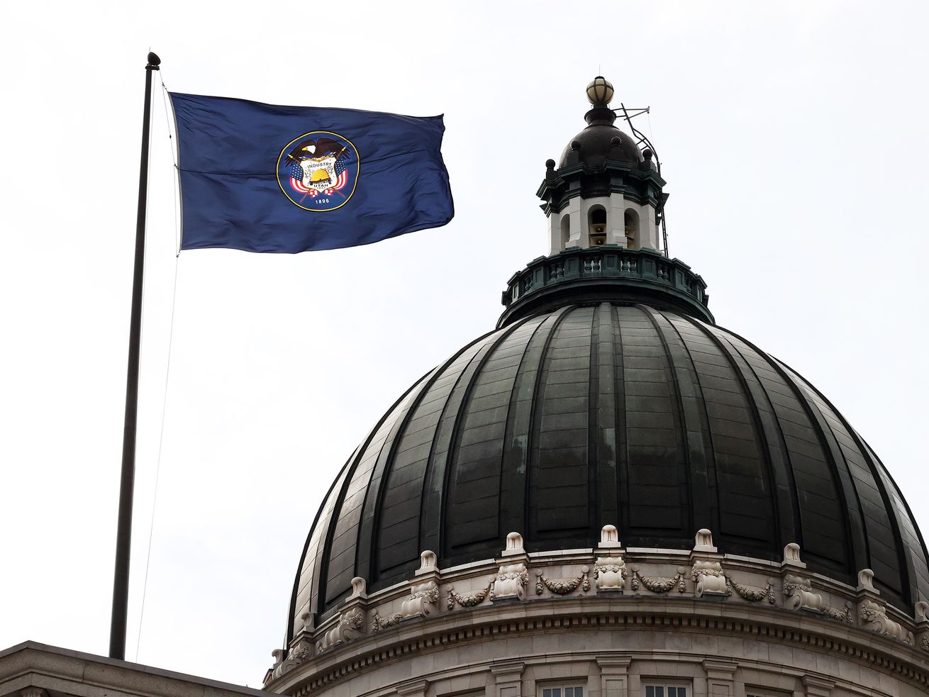 The Utah flag flies over the Capitol in Salt Lake City
on Friday, Jan. 22, 2021. The Utah flag flies over the Capitol in
Salt Lake City on Friday, Jan. 22, 2021. Sen. Daniel McCay,
R-Riverton, is proposing that the current flag be redesigned.