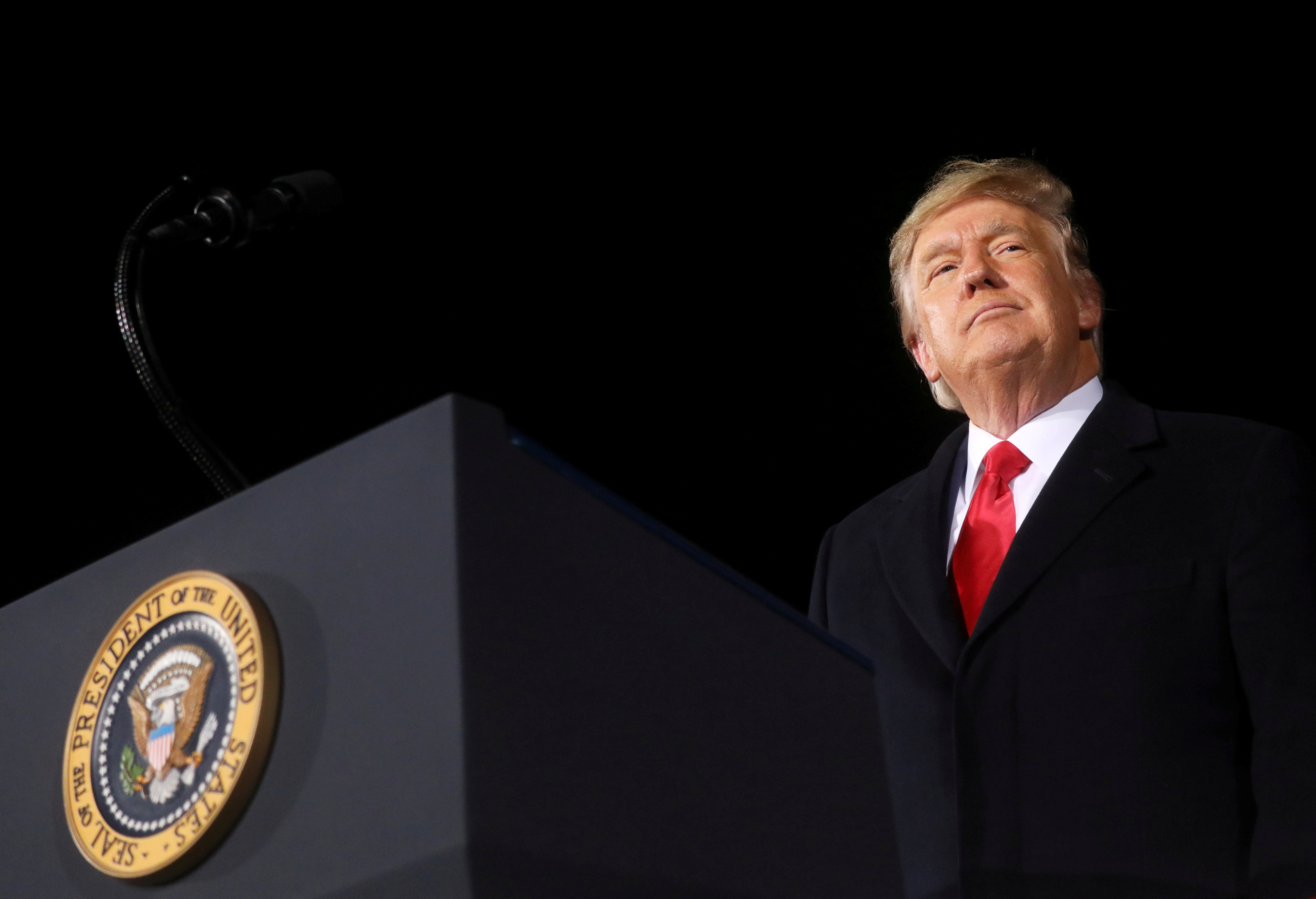 FILE PHOTO: U.S. President Donald Trump addresses a campaign rally in Dalton, Georgia, U.S., on the eve of the run-off election to decide both of Georgia's Senate seats January 4, 2021.