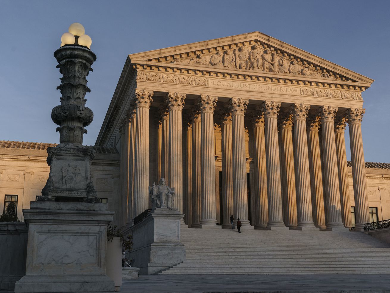 In this Nov. 6, 2020, file photo, the Supreme Court is
seen at sundown in Washington.