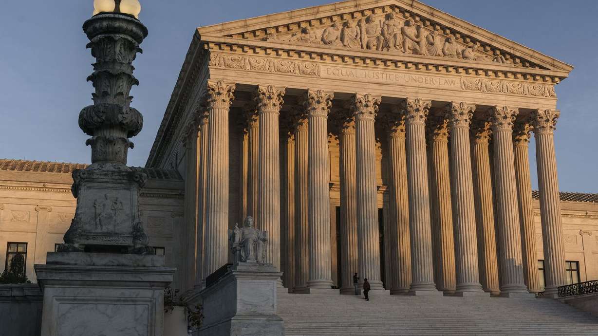 In this Nov. 6, 2020, file photo, the Supreme Court is
seen at sundown in Washington.