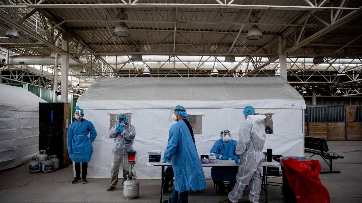 Utah National Guard soldiers staff a COVID-19 test site at the Fairpark in Salt Lake City on Saturday, Jan. 23, 2021.