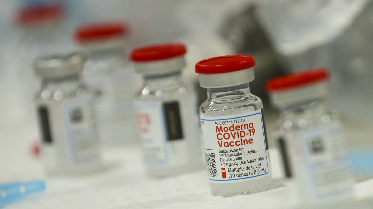 Syringes are filled with the Moderna COVID-19 vaccine at Salt Lake Countyâ??s mass vaccination site at the Mountain America Expo Center in Sandy on Monday, Jan. 18, 2021.