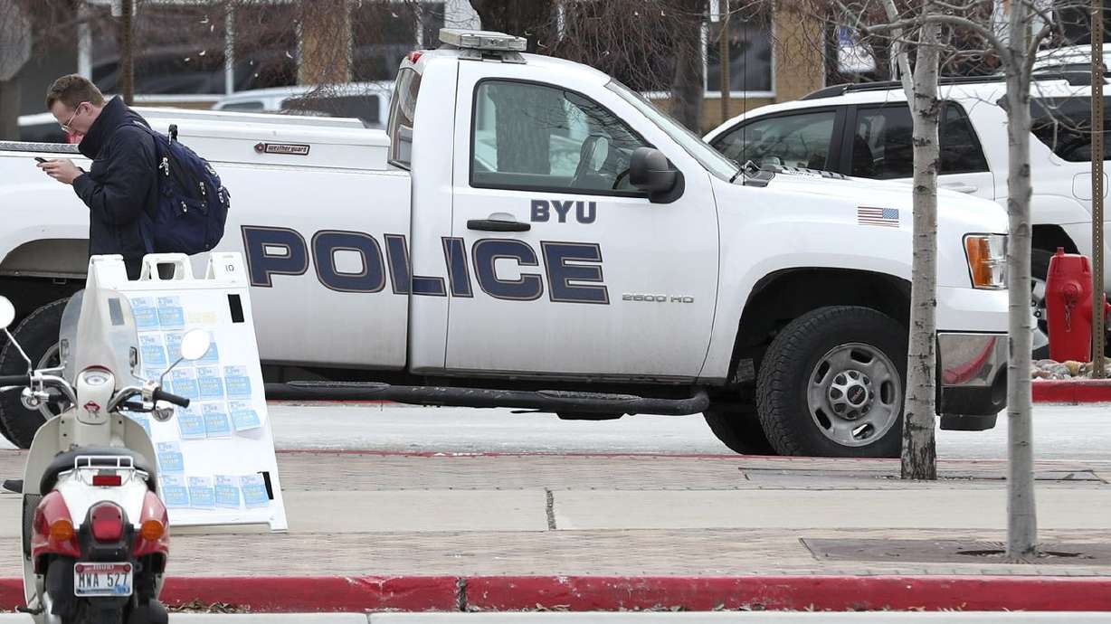 BYU police vehicles are parked outside the department’s
offices on the BYU campus in Provo on Thursday, Feb. 21, 2019.