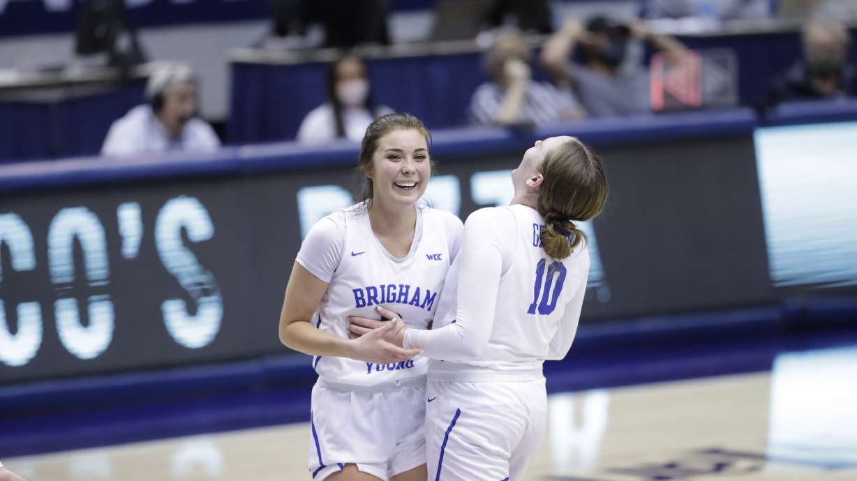 BYU guards Shaylee Gonzales, left, and Tegan Graham celebrate a bucket against Pacific during a West Coast Conference women's basketball game, Tuesday, Jan. 26, 2021 in the Marriott Center.