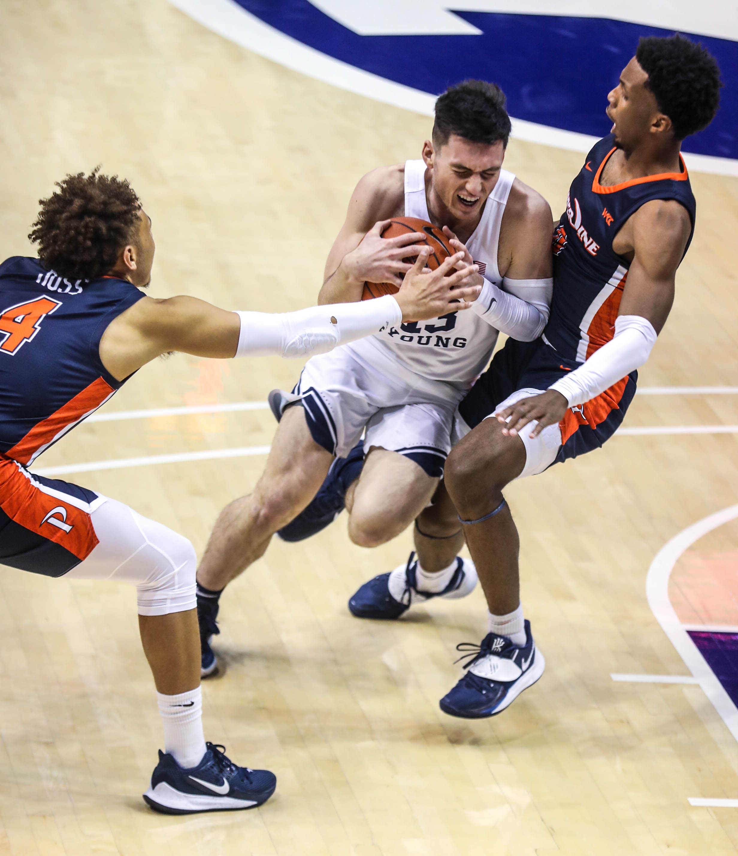 Brigham Young Cougars guard Alex Barcello (13) gets ready to shoot over the Pepperdine Waves position at the Marriott Center in Provo on Saturday, Jan. 23, 2021.