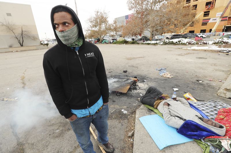 Tyrell Morris, who is homeless, stands near his shelter on 700 South in Salt Lake City on Tuesday, Nov. 10, 2020. The Kem C. Gardner Policy Institute published a report then identifying major problems within the state’s current homeless governance structure.