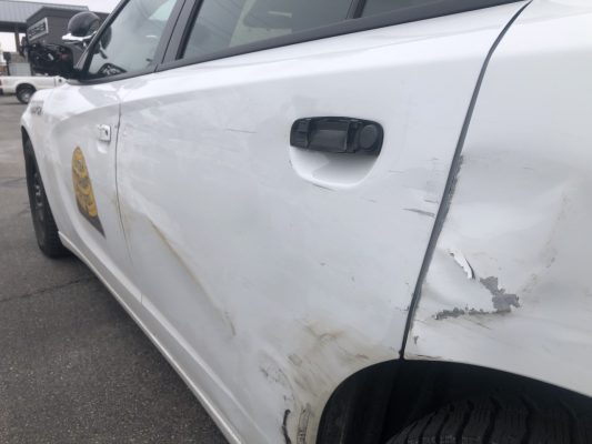 UHP Trooper Troy Giles’ patrol vehicle was hit by a car Wednesday morning, Jan. 27, 2021.