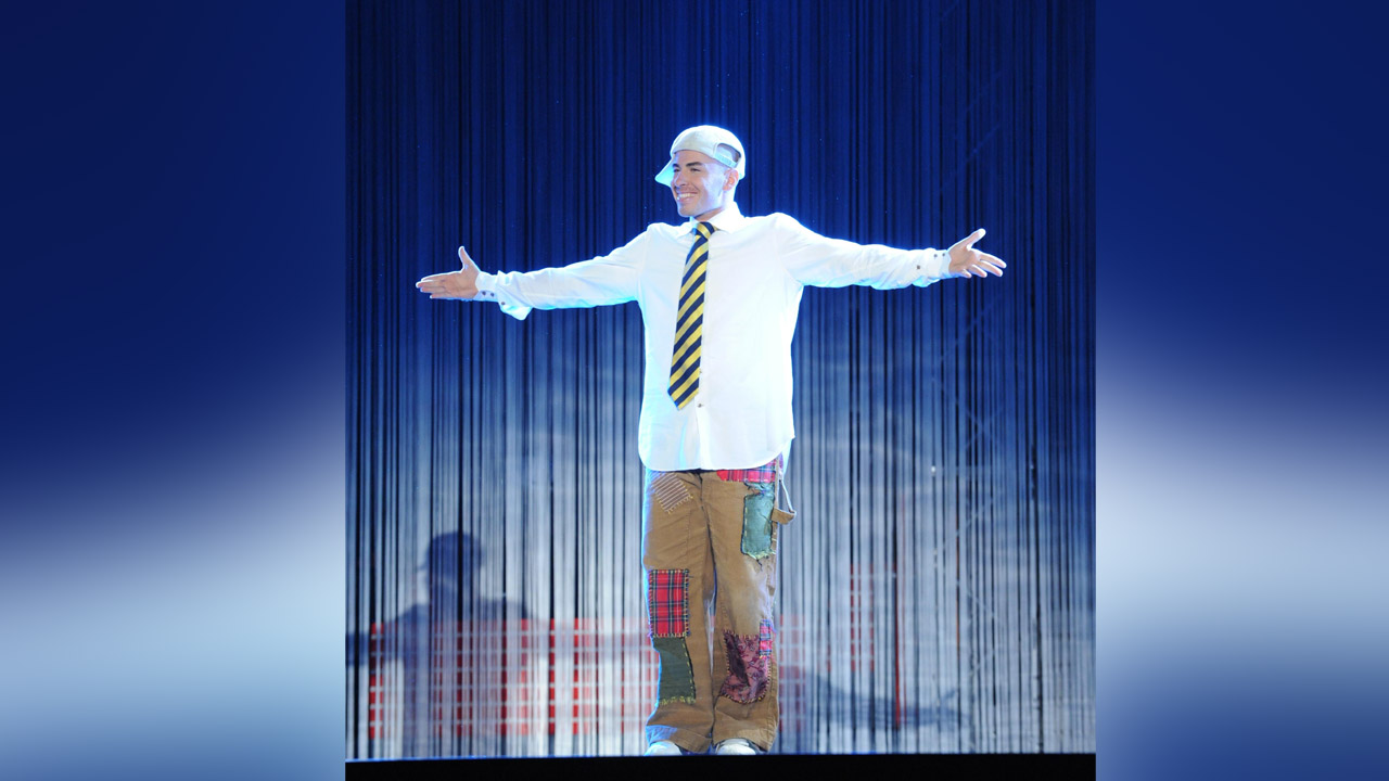 Marco Lui, AKA Mr. Lui performing onstage.