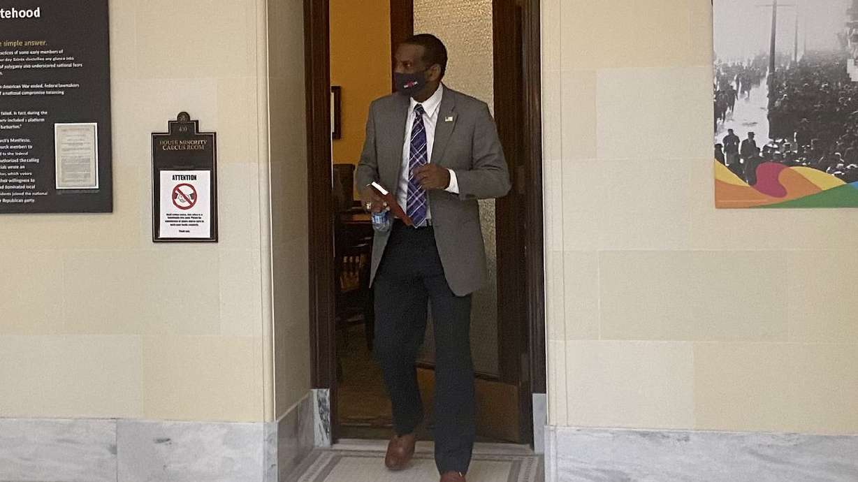 Rep. Burgess Owens., R-Utah, exits a meeting with Utah
House Democrats at the Capitol in Salt Lake City on Thursday, Jan.
28, 2021.
