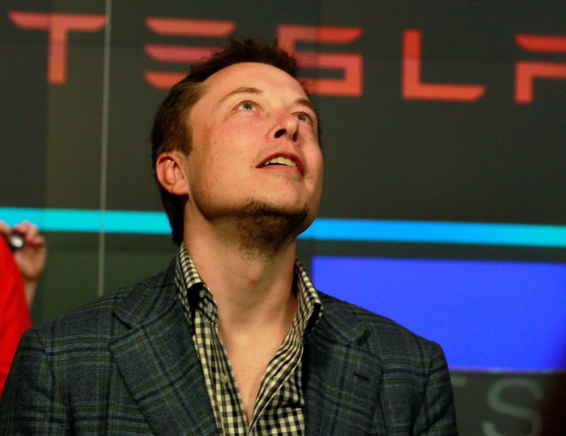 FILE PHOTO: CEO of Tesla Motors Elon Musk reacts following the company's initial public offering at the NASDAQ market in New York June 29, 2010. REUTERS/Brendan McDermid/File Photo