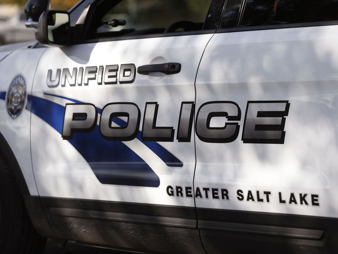 A Unified police car is parked at the Taylorsville
Precinct on Thursday, Oct. 8, 2020.
