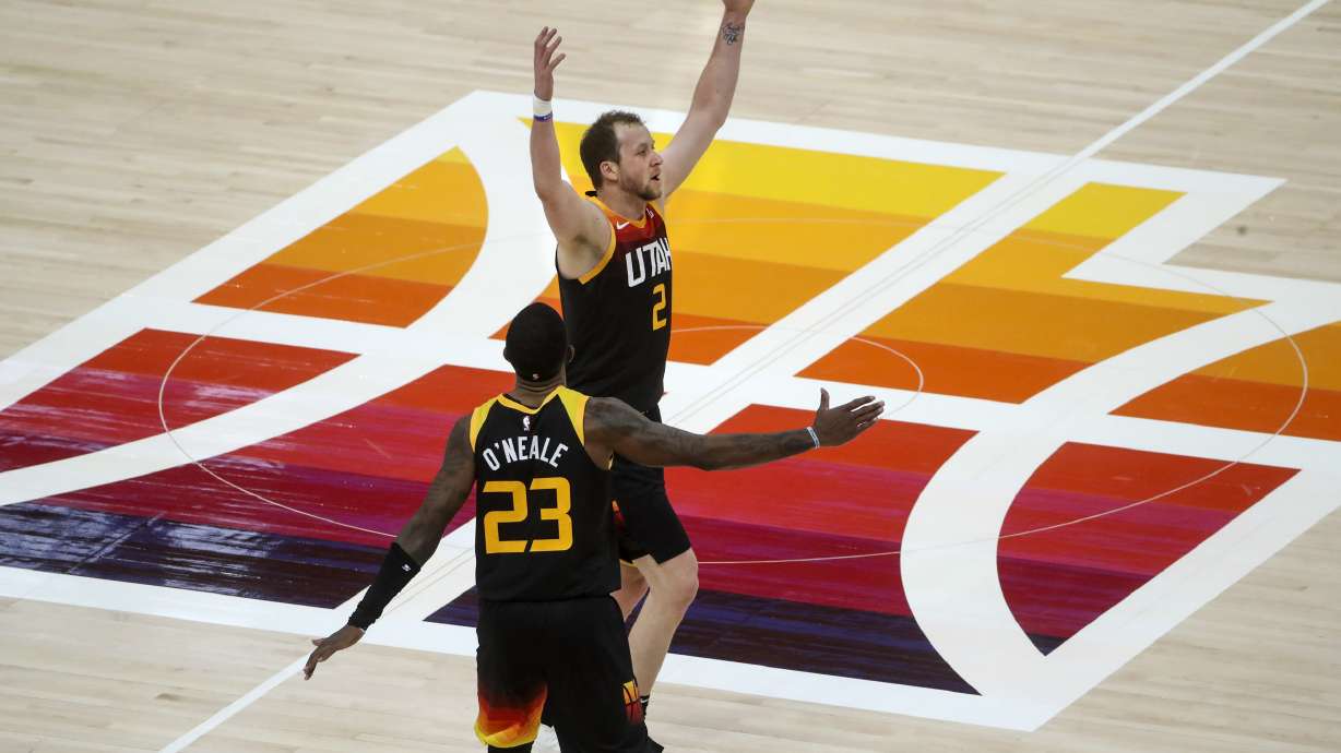 Utah Jazz forward Joe Ingles (2) holds his arms up after nailing a 3-pointer that pushed him past John Stockton as the Jazz all-time leader in 3-pointers during the Dallas Mavericks and Utah Jazz NBA game at Vivint Smart Home Arena in Salt Lake City on Friday, Jan. 29, 2021.